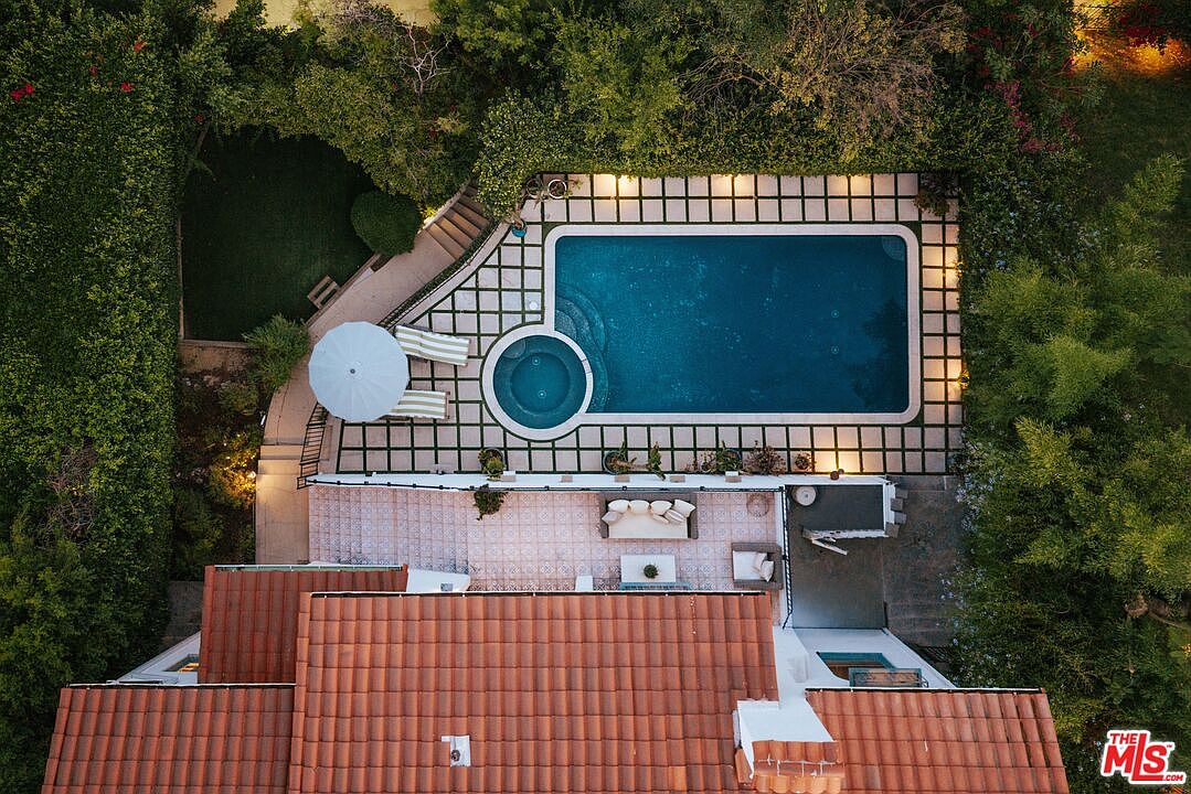 Aerial view of the property and pool