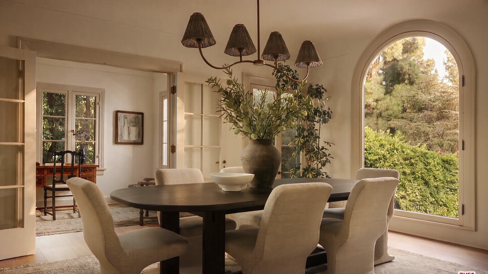 Camera moving through the dining room toward the music room